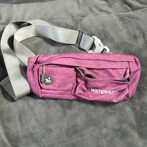 WATERFLY Fanny Pack for Women Men Water Resistant Waist Pouch Slim Belt Purple